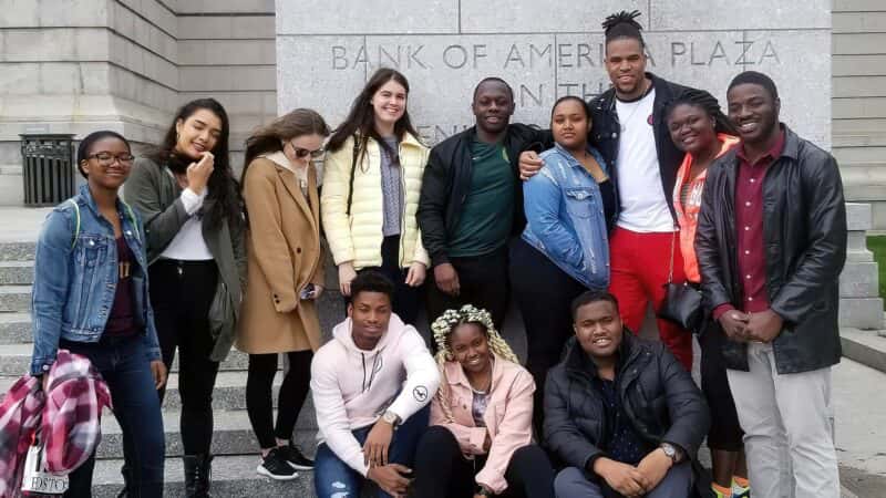 Students pose in front of the Museum of Fine Arts in Boston