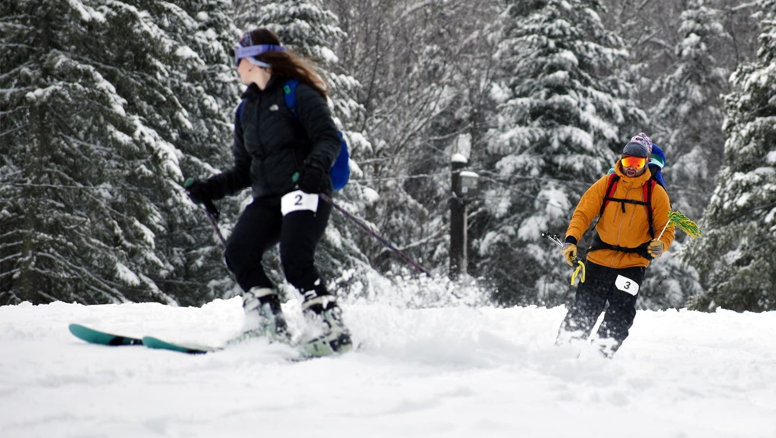 a family downhill ski together at the 2022 ski-shoe-ski event