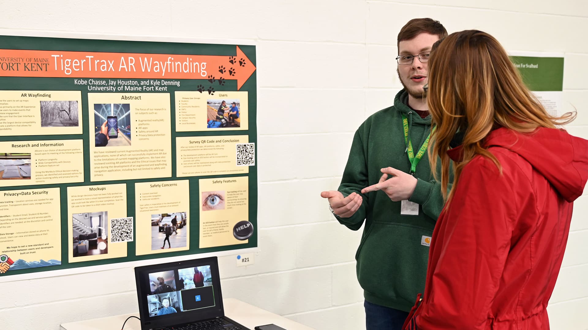 a male student presents his TigerTrax AR Wayfinding project during the 2022 Scholars' Symposium