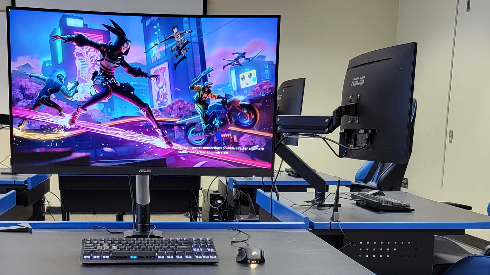photo of one of the eSports Center's gaming computers with a game-inspired image displayed on the screen