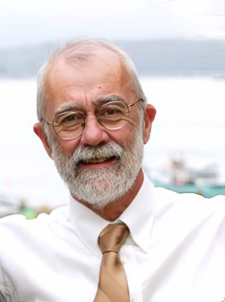 headshot of author Dennis Ledoux